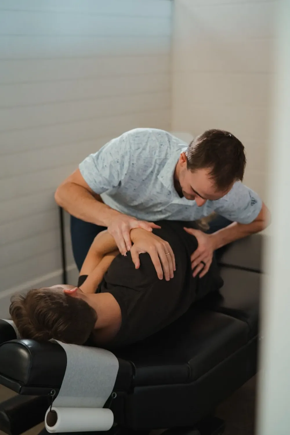Dr. Jeremiah Cox treating a patient